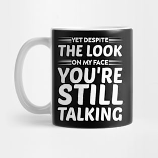 yet despite the look on my face you're still talking humor Mug